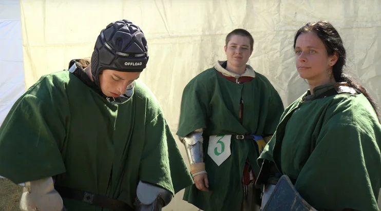 Female Buhurt fighters prepare for a fight